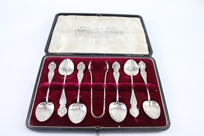 Lot 422F - EIGHT .925 STERLING SILVER EDWARD VII SOUVENIR SPOONS AND SUGAR TONGS IN CASE (8)