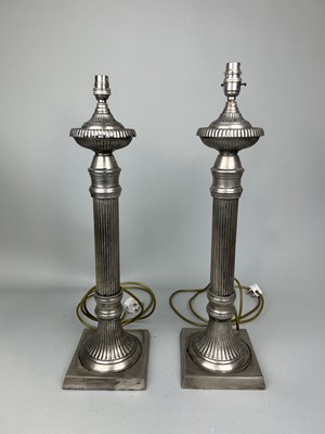 Lot 994A - A PAIR OF SILVER LAMPS