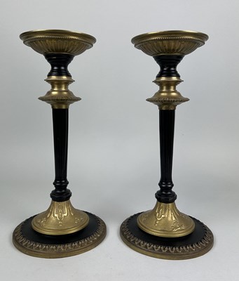 Lot 1075D - A PAIR OF GILT CANDLESTICKS