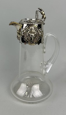 Lot 61 - A VICTORIAN SILVER MOUNTED CLARET JUG WITH FOX-HUNTING DESIGN