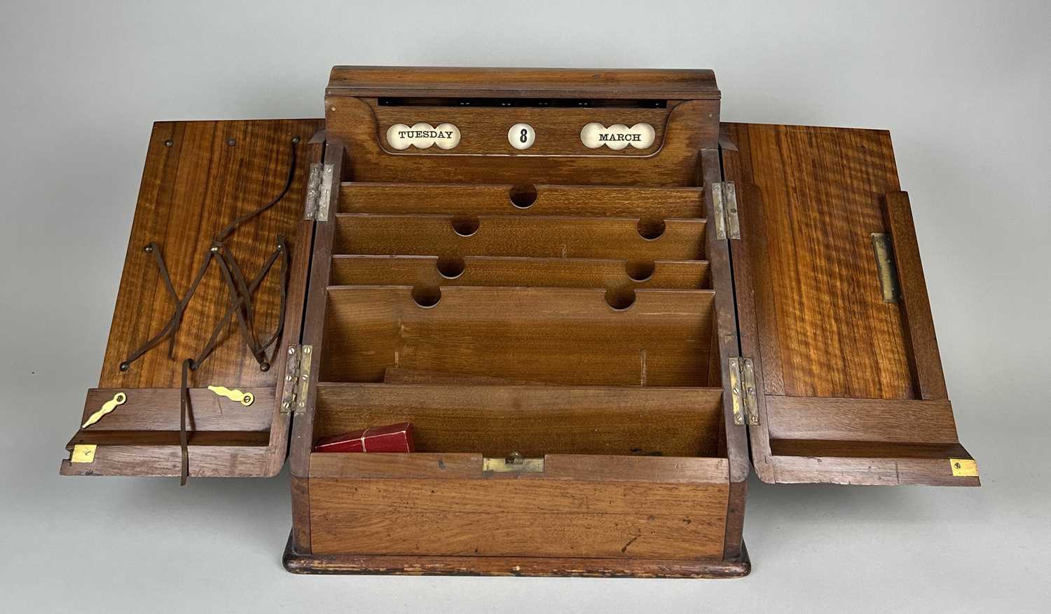 Lot 307 - AN ANTIQUE OAK DESK TIDY WITH CALENDAR