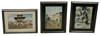 Lot 469 - A GROUP OF THREE ASIAN OR INDIAN WATERCOLOUR PAINTINGS ON PAPER DEPICTING STREET SCENES WITH TEMPLES AND FIGURES