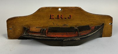 Lot 258 - AN ANTIQUE PAINTED WOODEN HALF HULL