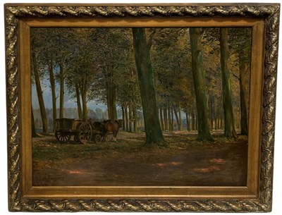 Lot 376 - FERNAND GAUDFROY (BELGIAN 1885-1964): AN OIL PAINTING ON CANVAS DEPICTING A HORSE AND CART IN A WOODLAND COPSE AT SUNSET