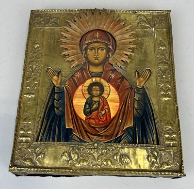 Lot 256 - A RUSSIAN ORTHODOX PAINTED ICON IN METAL CASE