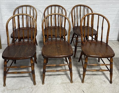 Lot 890 - A SET OF SIX 19TH CENTURY ELM AND ASH SPINDLE BACK SIDE CHAIRS