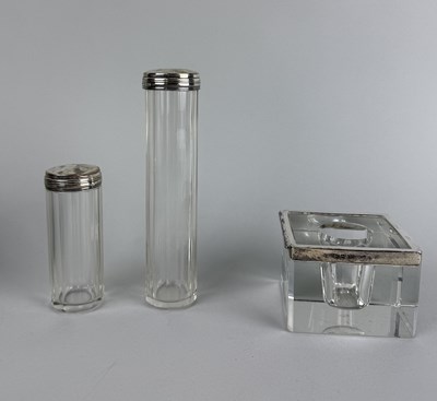 Lot 133 - A SILVER MOUNTED CANDLEHOLDER ALONG WITH TWO VANITY JARS