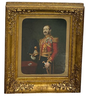 Lot 383 - GEORGE WYLIE HUTCHINSON (1852-1942): AN OIL PAINTING ON BOARD DEPICTING A 3/4 LENGTH PORTRAIT OF A DECORATED SOLDIER