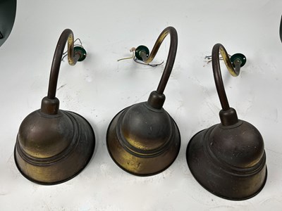 Lot 57 - A SET OF THREE BRASS LIGHTS
60cm each