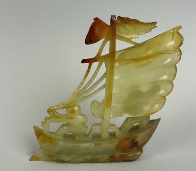 Lot 173 - A CHINESE JADE DEPICTING TWO FIGURES WITH A BOAT