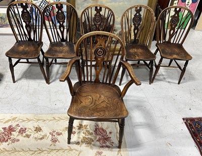 Lot 627 - A SET OF SIX EARLY 19TH CENTURY ASH AND ELM WINDSOR CHAIRS