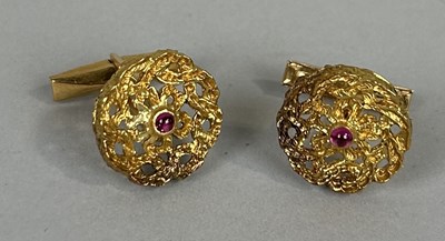 Lot 61 - A PAIR OF 18CT GOLD CUFFLINKS EACH SET WITH A SINGLE RUBY