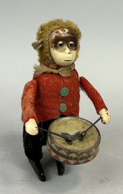 Lot 265 - A PRE-WAR CHUCO TIN MONKEY DRUMMER