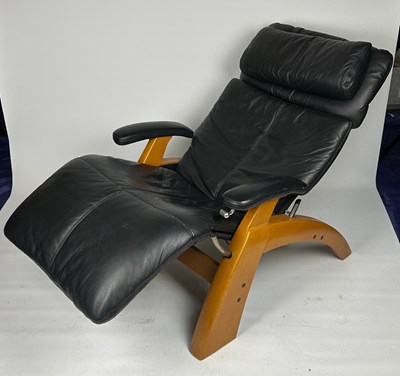 Lot 156 - A RECLINING LEATHER ARMCHAIR BY 'THE PERFECT...