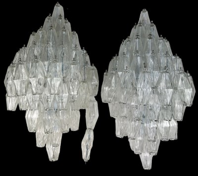 Lot 169 - A PAIR OF DESIGNER GLASS WALL LIGHTS ON WHITE...