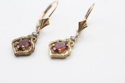 Lot 76 - A PAIR OF 9CT GOLD GARNET AND DIAMOND EARRINGS (1.8g)