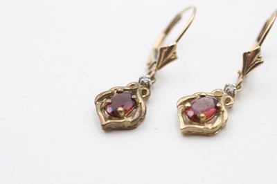 Lot 76 - A PAIR OF 9CT GOLD GARNET AND DIAMOND EARRINGS (1.8g)