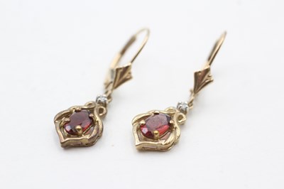 Lot 76 - A PAIR OF 9CT GOLD GARNET AND DIAMOND EARRINGS (1.8g)