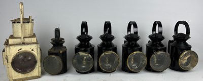 Lot 187 - A SET OF SEVEN WWII ERA RAILWAY LANTERNS (7)