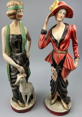 Lot 213 - A PAIR OF ART DECO MODELS OF LADIES, painted...