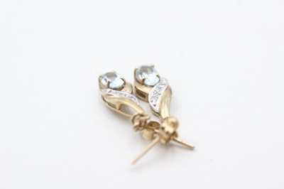 Lot 79 - A PAIR OF 9CT GOLD DIAMOND AND TOPAZ DROP EARRINGS (1.7g)