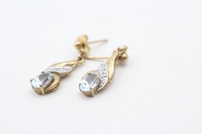 Lot 79 - A PAIR OF 9CT GOLD DIAMOND AND TOPAZ DROP EARRINGS (1.7g)
