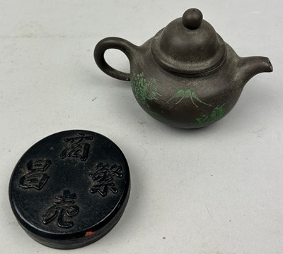 Lot 114 - A CHINESE YIXING TEA POT WITH GREEN PAINTED...