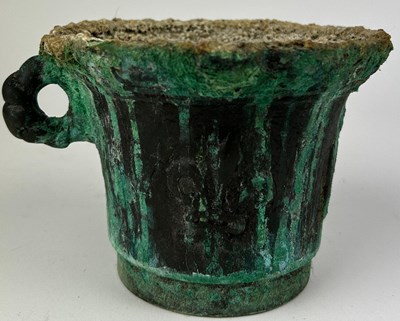 Lot 134 - A VERDIGRIS BRONZE MORTAR IN THE CLASSICAL...