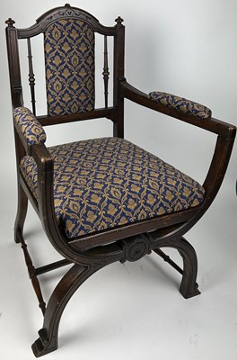 Lot 185 - A GLASTONBURY STYLE X FRAME ARMCHAIR,...