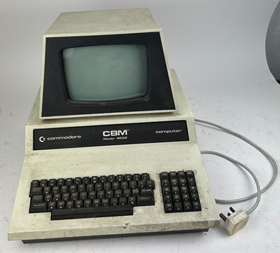 Lot 214 - A COMMODORE PET COMPUTER MODEL 4032, with plug....