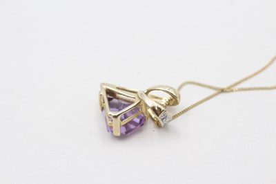Lot 87 - A 9CT GOLD AMETHYST AND DIAMOND PENDANT ON CHAIN(1.8g)