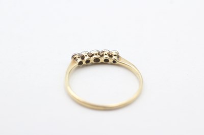 Lot 102 - A 18CT GOLD OLD CUT DIAMOND FIVE STONE RING (1.2g)
