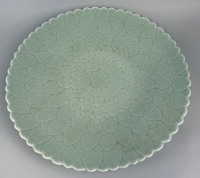 Lot 207 - A LARGE CELADON CHARGER WITH CHRYSANTHEMUM DESIGN