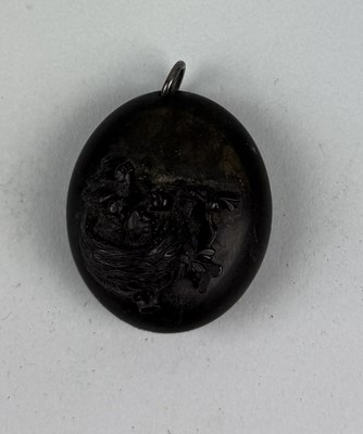 Lot 191 - A CARVED MOURNING LOCKET WITH BIRDS AND NEST, WITH LADIES PHOTOGRAPH WITHIN