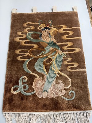 Lot 770 - A CHINESE EMBROIDERY WITH BUDDHIST FIGURE