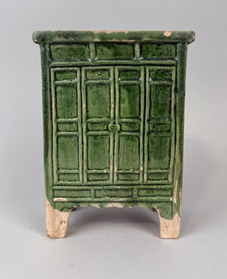 Lot 217 - A CHINESE MING DYNASTY GREEN GLAZED CERAMIC COURT CUPBOARD