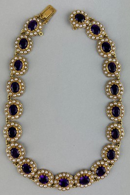 Lot 25 - A LARGE VICTORIAN 9CT GOLD AMETHYST AND SEED...