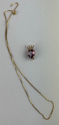 Lot 28 - A 9CT GOLD AND AMETHYST HEART SHAPED PENDANT...