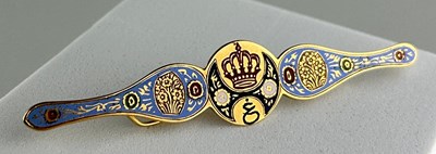 Lot 41 - A PERSIAN YELLOW METAL AND ENAMELLED BROOCH,...