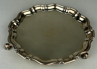 Lot 58 - A SILVER TRAY BY HUKIN AND HEATH,

Pie crust...