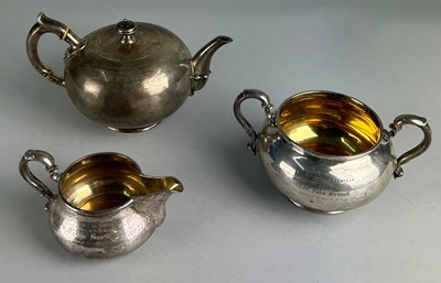 Lot 61 - A SILVER AND GILT TEA SET BY ROBERT GARRARD II...