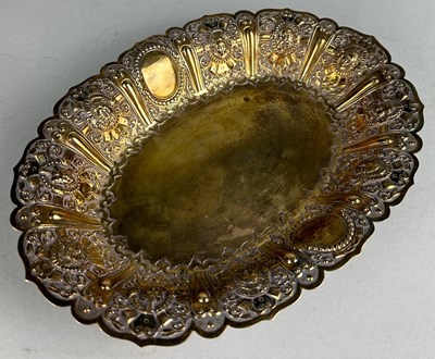 Lot 62 - A SILVER GILT DISH WITH MASKS OF CLASSICAL...