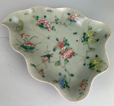 Lot 98 - A CHINESE CELADON LOBED LEAF SHAPED DISH...