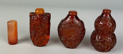 Lot 140 - A COLLECTION OF THREE AMBER STYLE SNUFF...