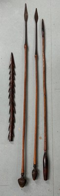 Lot 144 - A GROUP OF TRIBAL SPEARS, including one barbed...