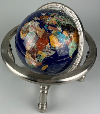 Lot 145 - A CHROME AND GLASS DESK GLOBE, with hardstone...