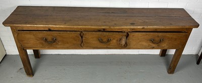 Lot 362 - A 19TH CENTURY ELM DRESSER BASE, 

The plank...