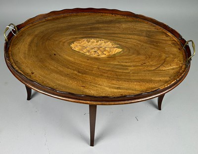 Lot 427 - A SCALLOPED EDGE LOW TABLE WITH CENTRAL...