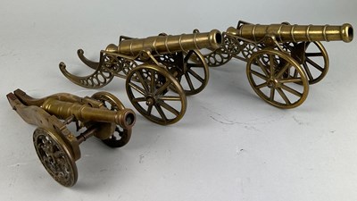 Lot 451 - THREE BRASS MODELS OF CANONS (3)