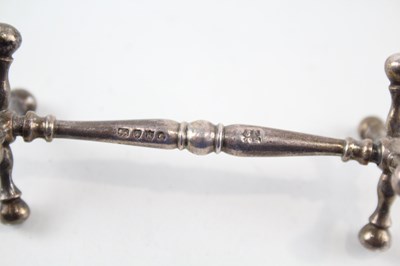 Lot 52 - PAIR OF ANTIQUE .925 STERLING SILVER KNIFE RESTS